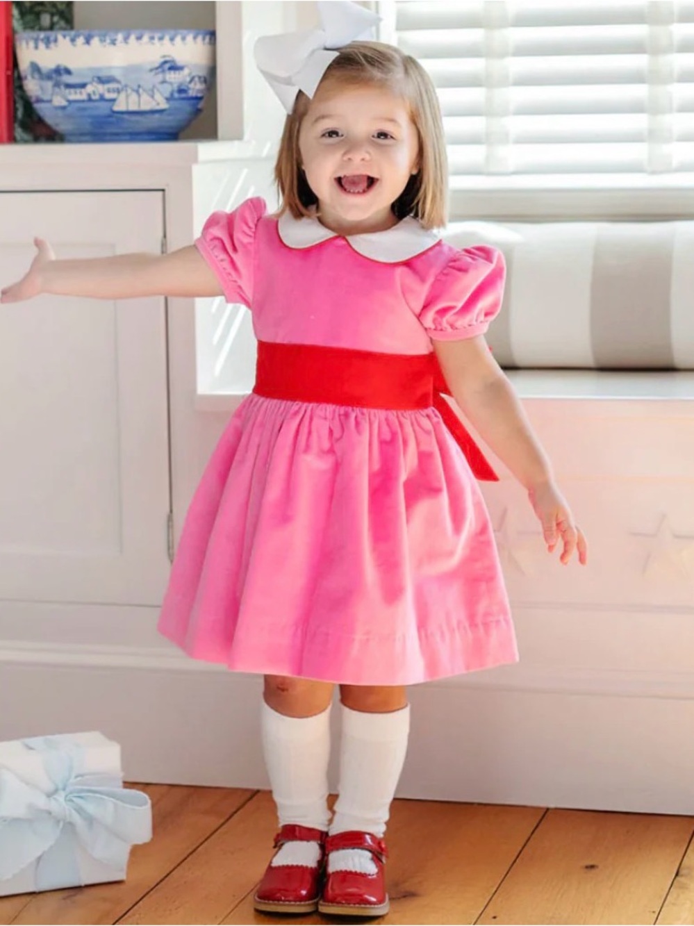 The Beaufort Bonnet Company Pink Dress with Red Sash and White Collar